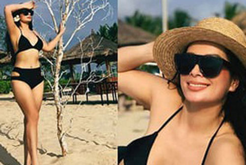 Thúy Hằng “khoe dáng” trên biển, tiết lộ “5 năm qua không dám diện bikini”