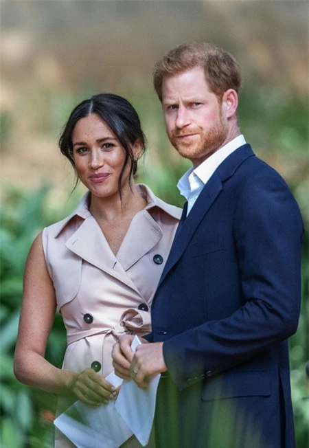 Vợ chồng Harry - Meghan tuyên bố rời hoàng gia từ tháng 1 với mong muốn được trở nên độc lập về tài chính và thoát khỏi sự soi xét của truyền thông. Ảnh: AFP. 