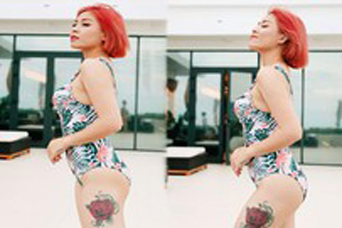 MC Hoàng Linh khoe đường cong sexy với đồ bơi, hình xăm lớn ở đùi thành tâm điểm