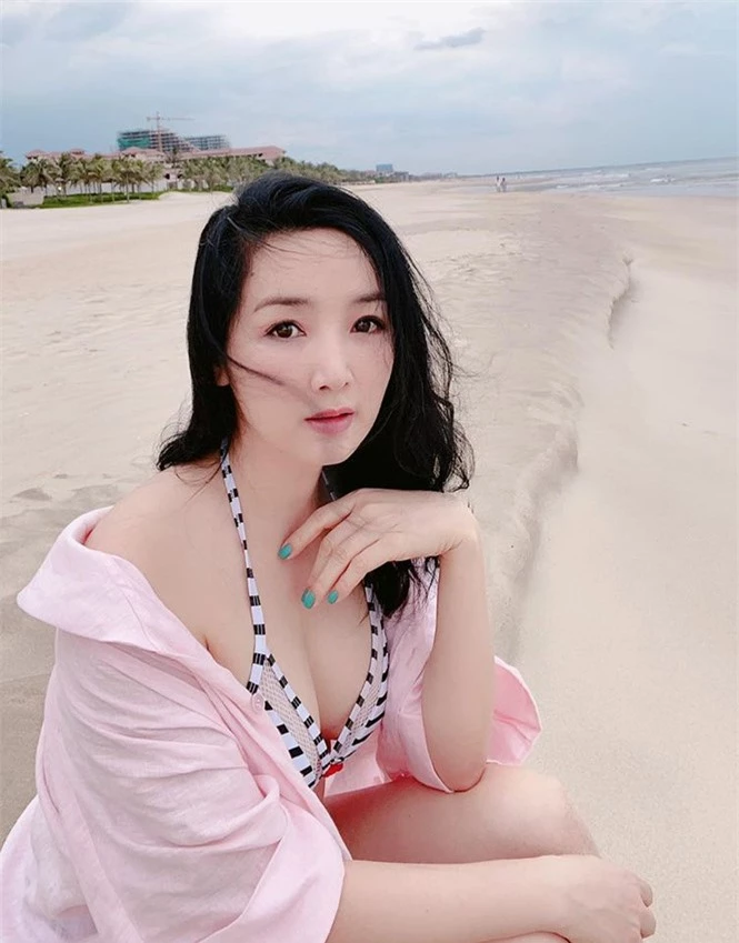 Hoa hậu Giáng My khoe vòng 1 gợi cảm với bikini  - ảnh 4