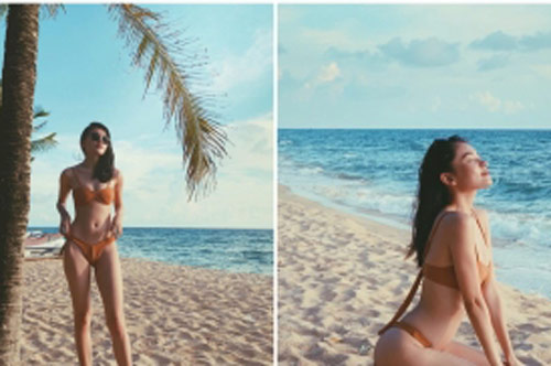 Á hậu Thùy Dung khoe trọn vẹn body quyến rũ cùng chân dài thẳng tắp khi diện bikini gợi cảm