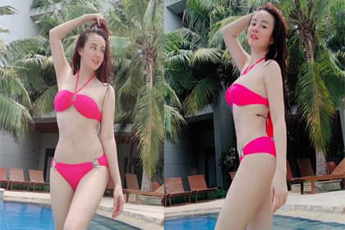 Vy Oanh diện bikini gợi cảm ở tuổi 34, tiết lộ từng tự ti vì vết rạn sau sinh