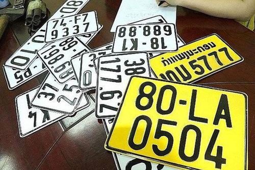 Từ 1/8, ô tô tải, xe khách, taxi phải đổi sang biển số màu vàng