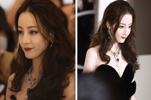 Trang điểm đậm như quý bà, Địch Lệ Nhiệt Ba vẫn tỏa sáng nhờ vòng một căng đầy gợi cảm