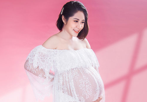 Đặng Thu Thảo khoe bụng bầu song sinh