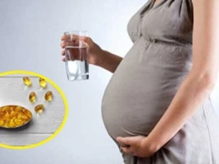 Phụ nữ uống dầu cá khi mang thai, lợi ích tăng gấp 3