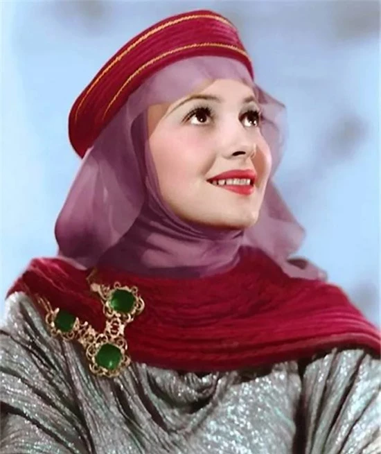 Năm 1938, cô tiếp tục ghi dấu ấn với vai người đẹp trong phim The Adventures of Robin Hood.