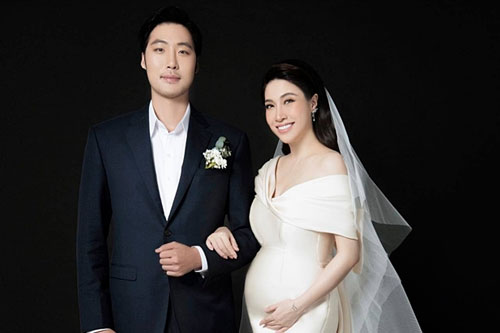 Pha Lê 'bế' bầu chụp ảnh cưới cùng chồng Mỹ gốc Hàn