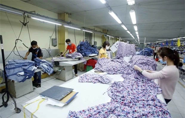 Đức hỗ trợ công nhân dệt may Việt Nam vượt COVID-19 - Ảnh 1. Đức hỗ trợ công nhân dệt may Việt Nam vượt COVID-19 - Ảnh 1.