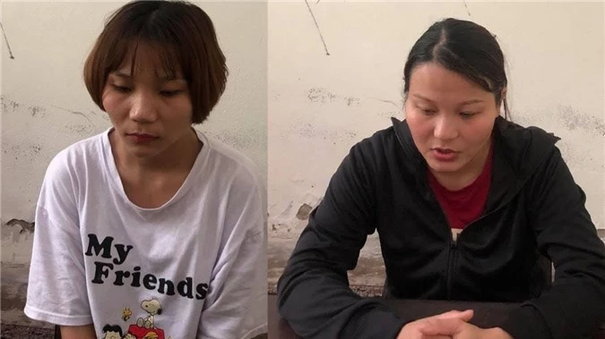 Uông Thị Trang và em gái Uông Thị Mai tại cơ quan điều tra.