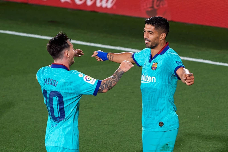 Messi và Suarez khi còn sát cánh với nhau.