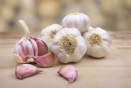 Đau đầu kinh niên cũng khỏi tức khắc nếu bạn dùng tỏi theo đúng cách đơn giản này
