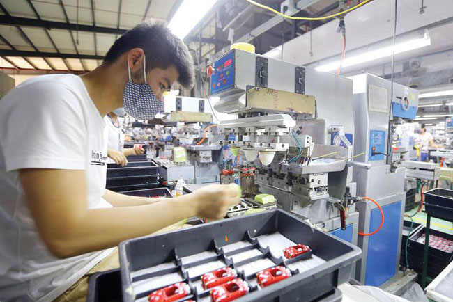 Fitch Solutions: Kinh tế Việt Nam đang trên đà phục hồi