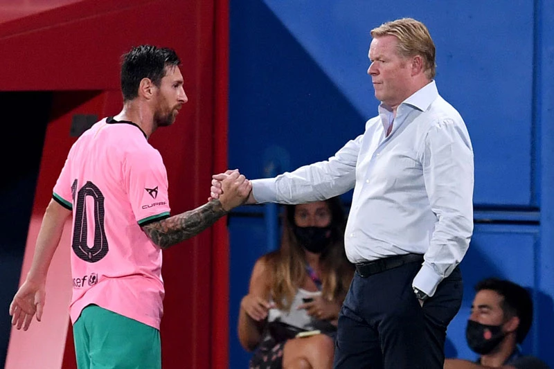 Messi và HLV Koeman.