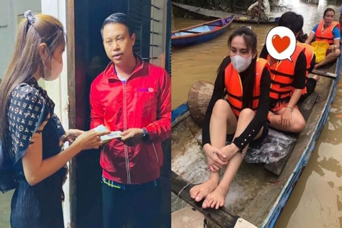 Thủy Tiên ngồi xuồng đi cứu trợ người dân Huế