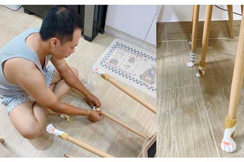 Sợ kéo ghế khiến vợ giật mình, ông chồng lọ mọ đi tất cho... chân ghế