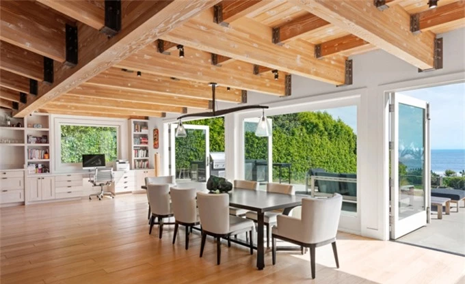 The living room is open to the kitchen and dining room, creating an airy space.