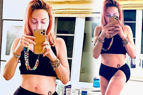 Madonna khoe cơ bụng săn chắc ở tuổi 62