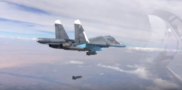 Máy bay ném bom Su-34 của Nga ném bom dẫn đường. Ảnh: TASS.