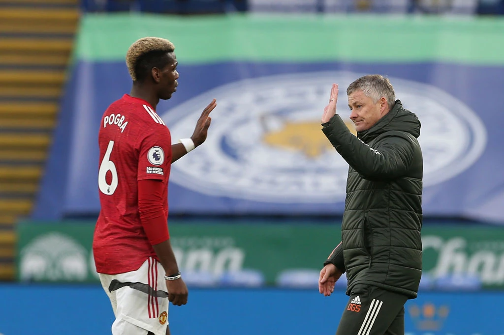 Pogba và HLV Solskjaer.