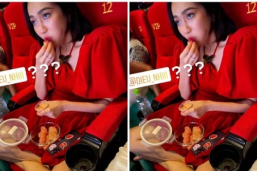 Diệu Nhi để chân lên ghế, mang đồ ăn ngoài vào rạp chiếu phim