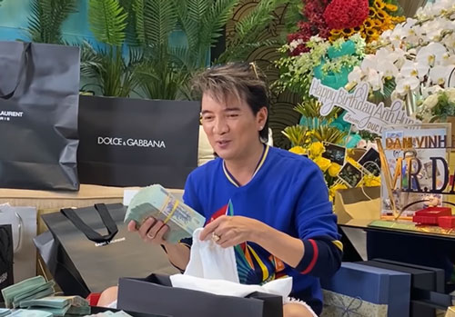 Hé lộ thân phận chủ nhân hộp quà 2 tỷ tiền mặt tặng Đàm Vĩnh Hưng