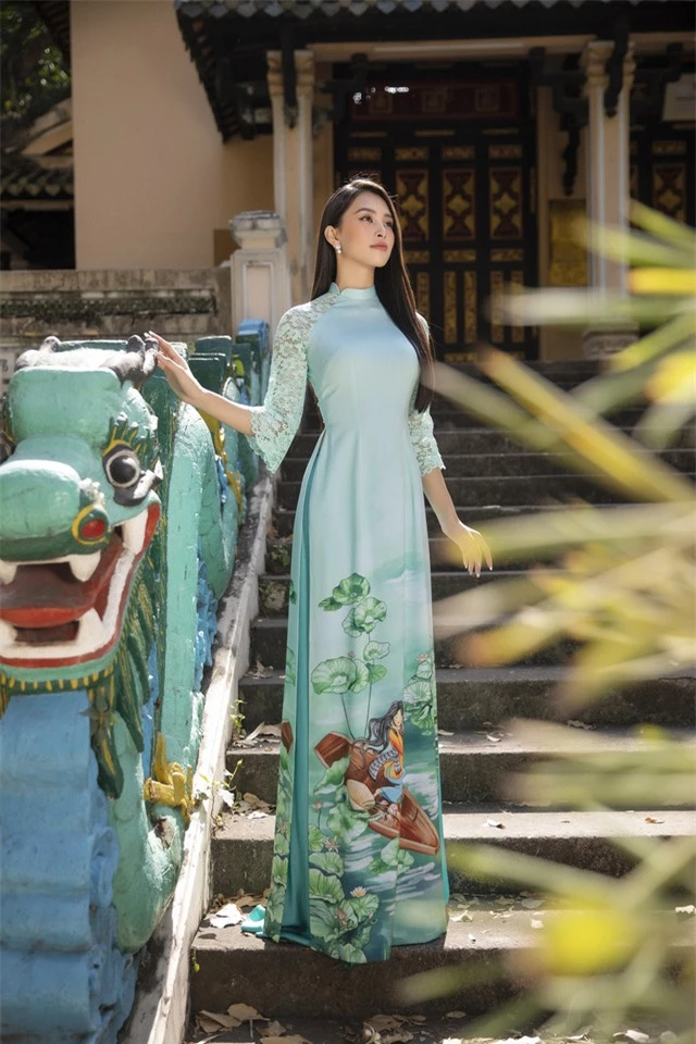 Hoa hậu Tiểu Vy đẹp tinh khôi với áo dài Tết - Ảnh 11.