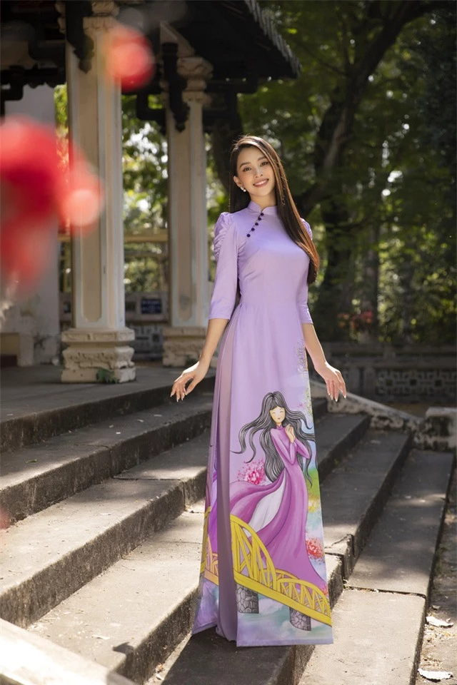 Hoa hậu Tiểu Vy đẹp tinh khôi với áo dài Tết - Ảnh 12.