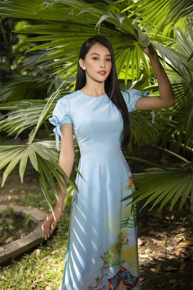 Hoa hậu Tiểu Vy đẹp tinh khôi với áo dài Tết - Ảnh 4.