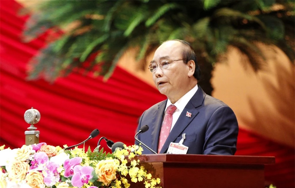 Đồng chí Nguyễn Xuân Phúc, Ủy viên Bộ Chính trị, Thủ tướng Chính phủ thay mặt Đoàn Chủ tịch đọc Diễn văn khai mạc Đại hội