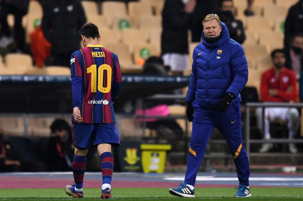 Messi và HLV Koeman.
