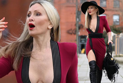 Mẫu 50 tuổi Caprice Bourret mặc váy xẻ đến eo táo bạo