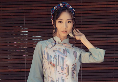 Người đẹp được ví là 'bản sao' của Nguyễn Thị Huyền tái xuất với áo dài