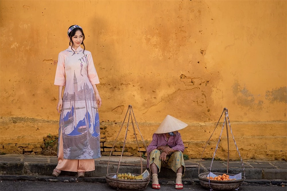 Người đẹp được ví là 'bản sao' của Nguyễn Thị Huyền tái xuất với áo dài ảnh 9