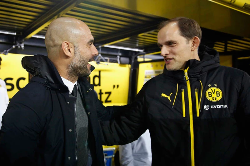 Tuchel (phải) không có được thành tích tốt mỗi khi đối đầu với Guardiola.