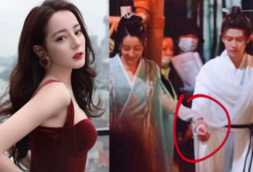 Địch Lệ Nhiệt Ba bị soi cảnh tươi cười nắm tay Nhậm Gia Luân, vẻ "thờ ơ" của nhà trai gây chú ý