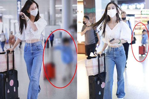 Angelababy bị chỉ trích vì mải nghe điện thoại bỏ bê con trai ở sân bay