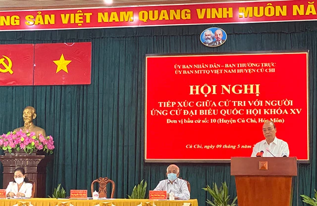 Chủ tịch nước Nguyễn Xuân Phúc trình bày Chương trình hành động tại Hội nghị tiếp xúc cử tri huyện Củ Chi sáng 9/5.