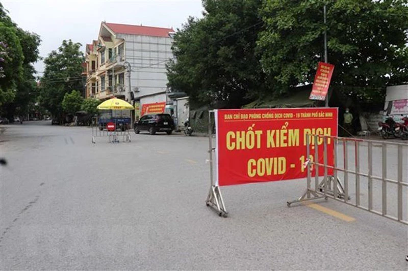 Bắc Ninh yêu cầu người dân 3 huyện, thành phố không ra khỏi nhà sau 20h. Ảnh: TTXVN.