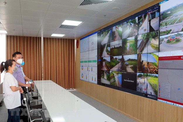 Lực lượng công nghệ hoạt động 24/7 phục vụ phòng chống dịch COVID-19 do Bộ Thông tin và Truyền thông thành lập, có tên gọi là Trung tâm công nghệ phòng, chống dịch COVID-19 quốc gia. (Ảnh: TTXVN) Lực lượng công nghệ hoạt động 24/7 phục vụ phòng chống dịch COVID-19 do Bộ Thông tin và Truyền thông thành lập, có tên gọi là Trung tâm công nghệ phòng, chống dịch COVID-19 quốc gia. (Ảnh: TTXVN)