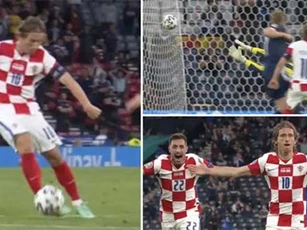 Modric ghi tuyệt phẩm trivela vào lưới Scotland để thiết lập kỷ lục mới