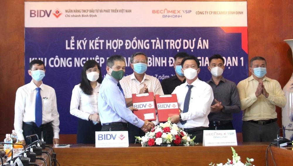 lễ ký kết hợp đồng tài trợ để thực hiện dự án Khu công nghiệp (KCN) Becamex Bình Định (giai đoạn 1)