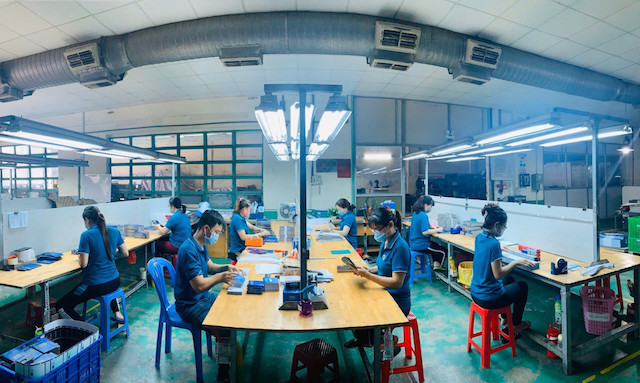 Công nhân làm việc tại doanh nghiệp hoạt động ‘3 tại chỗ’ tại TP Hồ Chí Minh.