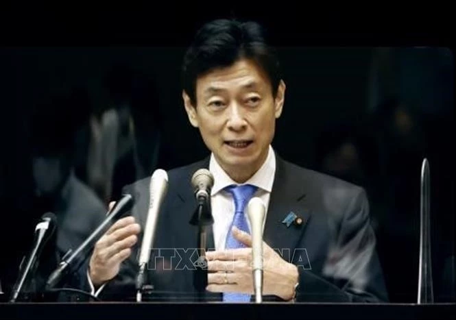 Bộ trưởng Tái thiết Kinh tế Yasutoshi Nishimura tại một cuộc họp ở Tokyo. Ảnh: Kyodo/TTXVN