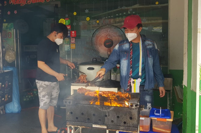 TP Hồ Chí Minh: Quận 7 và huyện Củ Chi ngày đầu thí điểm mở lại hoạt động có kiểm soát