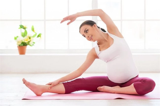 Đau lưng khi mang thai: Nguyên nhân và cách điều trị - Ảnh 2.