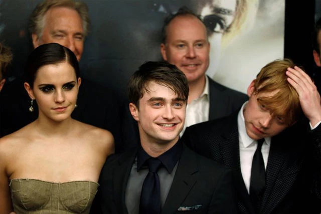 (Từ phải sang) Rupert Grint, Daniel Radcliffe và Emma Watson đến dự buổi ra mắt bộ phim "Harry Potter và bảo bối tử thần: Phần 2" tại New York, ngày 11 tháng 7 năm 2011. (Ảnh: Reuters-Yonhap)