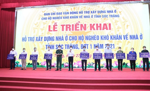 Lễ triển khai xây dựng nhà ở cho hộ nghèo khó khăn về nhà ở tỉnh Sóc Trăng đợt 1 năm 2021 .