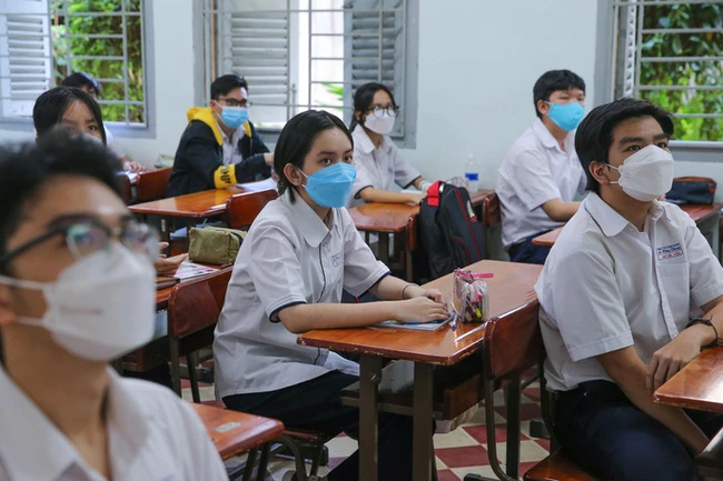 Học sinh lớp 9 và12 tại TP Hồ Chí Minh đã học trực tiếp. (Ảnh:NLĐ)