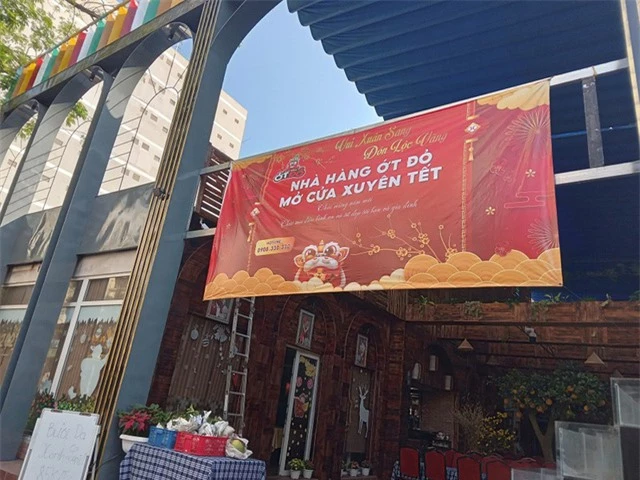Nhiều nhà hàng, chuỗi cà phê ở TP Hồ Chí Minh mở cửa xuyên Tết - Ảnh 1.